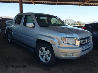 2011 Honda Ridgeline RTL with VIN 5FPYK1F54BB001086, listed as a IAAI auction lot 42598555 with 126,125 mi miles and . Bid and sale history available at DreamBid. Image 1.