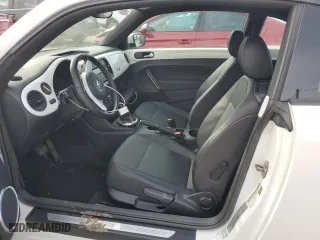 2012 Volkswagen Beetle 2.5L PZEV with VIN 3VWJP7AT6CM605642, listed as a Copart auction lot 80018214 with 101,694 mi miles and Salvage Title. Bid and sale history available at carsss.com. Image 7.