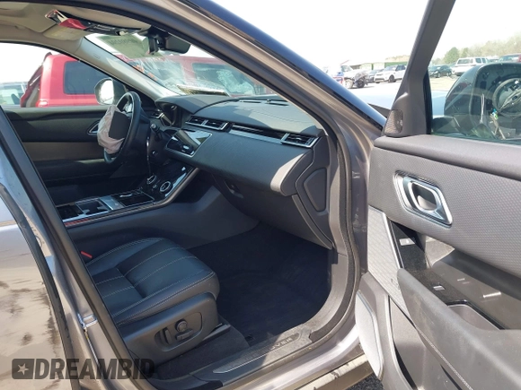 2020 Land Rover Range Rover Velar S z VIN SALYB2EX7LA259607, wystawiony jako IAAI lot #40980294 z przebiegiem 95 967 mil mil oraz . Historia ofert i sprzedaży dostępna na DreamBid. Obrazek 5.