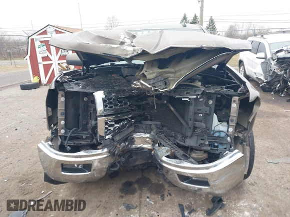 2015 Chevrolet Silverado 1500 LT with VIN 1GCVKREC9FZ237338, listed as a IAAI auction lot 41897225 with 154,229 mi miles and . Bid and sale history available at DreamBid. Image 6.