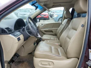 2010 Honda Odyssey Touring with VIN 5FNRL3H94AB056657, listed as a Copart auction lot 72658934 with 202,690 mi miles and Salvage title. Bid and sale history available at DreamBid. Image 7.