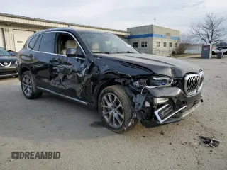 2021 BMW X5 xDrive45e with VIN 5UXTA6C07M9E59778, listed as a Copart auction lot 47310465 with 70,149 mi miles and Salvage Title. Bid and sale history available at carsss.com. Image 4.