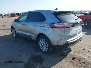 2022 Ford Edge Titanium z VIN 2FMPK4K95NBA33637, wystawiony jako IAAI lot #42074777 z przebiegiem 58 733 mil mil oraz . Historia ofert i sprzedaży dostępna na DreamBid. Obrazek 3.