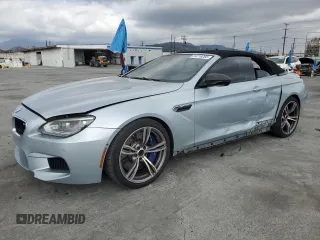 2014 BMW M6 z VIN WBSLZ9C50EDZ78344, wystawiony jako Copart lot #54719265 z przebiegiem 59 556 mil mil oraz Szkoda całkowita • Salvage title. Historia ofert i sprzedaży dostępna na DreamBid. Obrazek 1.