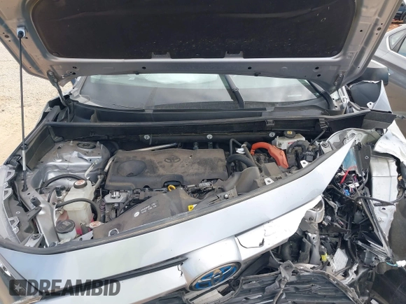 2021 Toyota RAV4 Hybrid LE z VIN JTMLWRFV8MD129136, wystawiony jako IAAI lot #41644636 z przebiegiem 82 253 mil mil oraz . Historia ofert i sprzedaży dostępna na DreamBid. Obrazek 10.