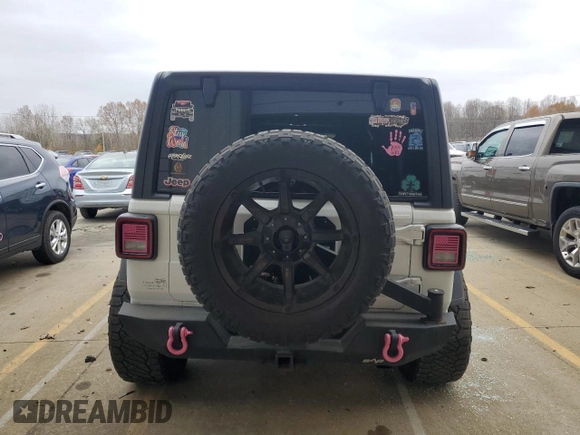 2020 Jeep Wrangler Unlimited Willys with VIN 1C4HJXDN3LW129737, listed as a Copart auction lot 80152464 with 97,700 mi miles and Salvage title. Bid and sale history available at DreamBid. Image 6.