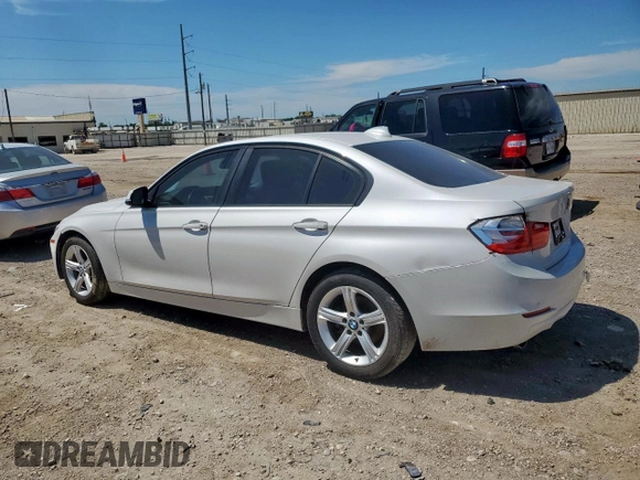 2015 BMW 3 Series 320i with VIN WBA3B1C5XFP831703, listed as a Copart auction lot 57561155 with 135,034 mi miles and Salvage title. Bid and sale history available at DreamBid. Image 2.