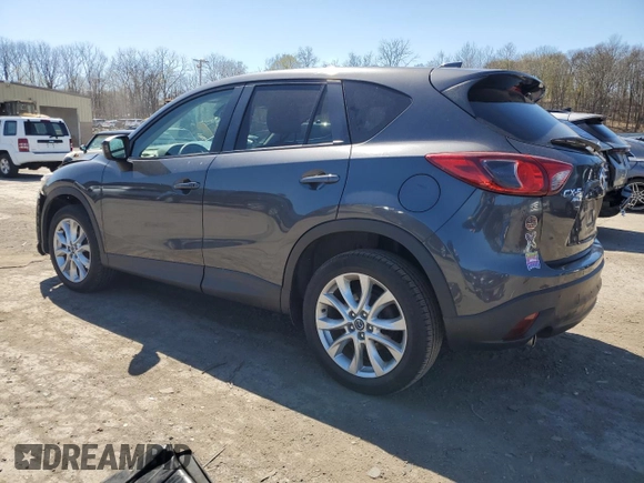 2014 Mazda CX-5 Grand Touring with VIN JM3KE4DY4E0422739, listed as a Copart auction lot 53234745 with 54,152 mi miles and Salvage Title. Bid and sale history available at carsss.com. Image 2.
