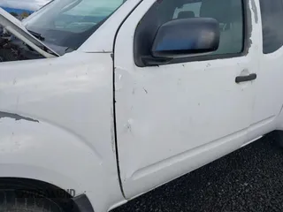 2007 Nissan Frontier SE with VIN 1N6AD06WX7C410282, listed as a IAAI auction lot 40913949 with 281,032 mi miles and . Bid and sale history available at DreamBid. Image 6.