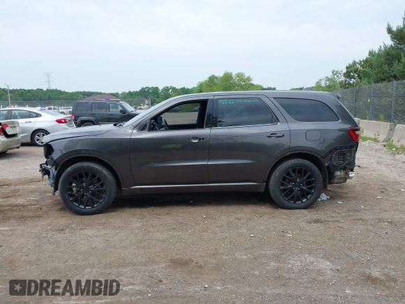 2015 Dodge Durango SXT with VIN 1C4RDJAG0FC947060, listed as a IAAI auction lot 42505938 with 124,705 mi miles and . Bid and sale history available at DreamBid. Image 14.