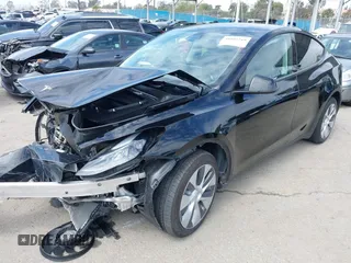 2023 Tesla Model Y Long Range z VIN 7SAYGDEE2PF863200, wystawiony jako IAAI lot #41805168 z przebiegiem 25 480 mil mil oraz . Historia ofert i sprzedaży dostępna na DreamBid. Obrazek 2.