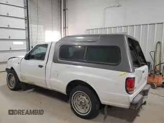 2000 Mazda B-Series 2WD Truck SX with VIN 4F4YR12CXYTM35082, listed as a Copart auction lot 82168854 with 0 mi miles and Salvage Title. Bid and sale history available at carsss.com. Image 2.