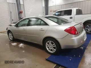 2006 Pontiac G6 6-Cyl z VIN 1G2ZG558764174412, wystawiony jako Copart lot #45677485 z przebiegiem 286 524 mil mil oraz Czysty tytuł • Clean title. Historia ofert i sprzedaży dostępna na DreamBid. Obrazek 2.