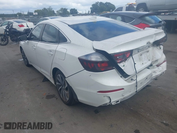 2019 Honda Insight Touring with VIN 19XZE4F91KE007748, listed as a IAAI auction lot 40233174 with 78,036 mi miles and . Bid and sale history available at DreamBid. Image 3.