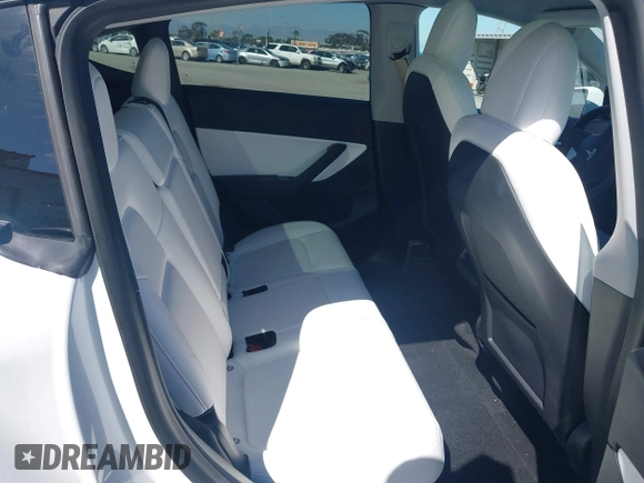 2020 Tesla Model Y Long Range with VIN 5YJYGDEE2LF044811, listed as a IAAI auction lot 41839136 with 68,445 mi miles and . Bid and sale history available at DreamBid. Image 8.