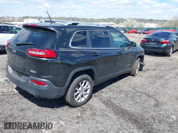 2014 Jeep Cherokee Latitude with VIN 1C4PJMCS8EW257959, listed as a IAAI auction lot 41987529 with 124,749 mi miles. Bid and sale history available at carsss.com. Image 4.