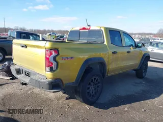 2023 Chevrolet Colorado 4WD Trail Boss with VIN 1GCPTEEK0P1197768, listed as a IAAI auction lot 41320246 with 21,425 mi miles. Bid and sale history available at carsss.com. Image 4.