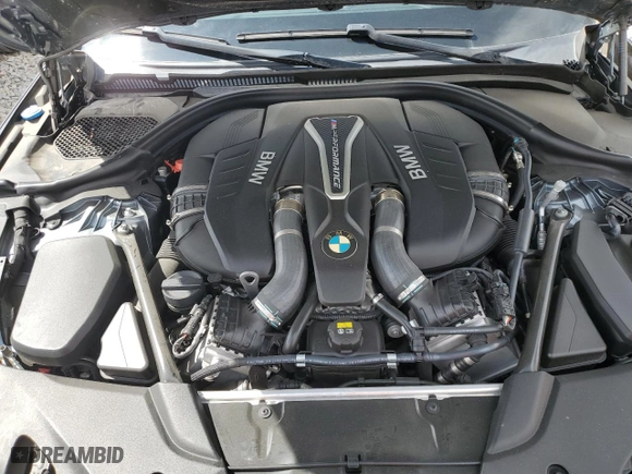 2018 BMW 5 Series M550i xDrive with VIN WBAJB9C51JB034980, listed as a Copart auction lot 51052495 with 55,705 mi miles and Clean Title. Bid and sale history available at carsss.com. Image 11.