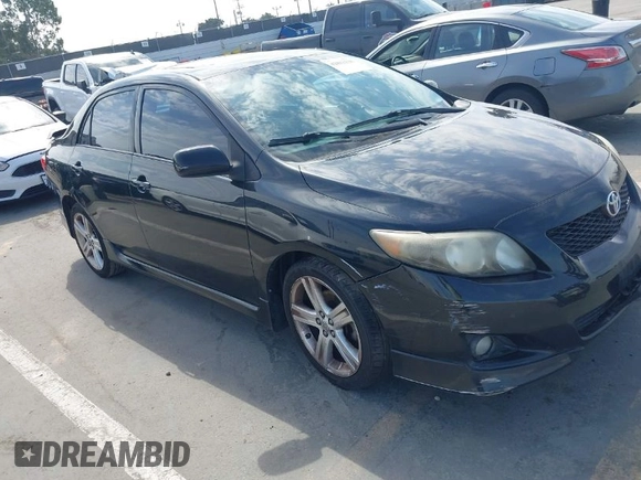 2009 Toyota Corolla XRS with VIN 1NXBE40EX9Z100623, listed as a IAAI auction lot 42032138 with 183,901 mi miles. Bid and sale history available at carsss.com. Image 1.