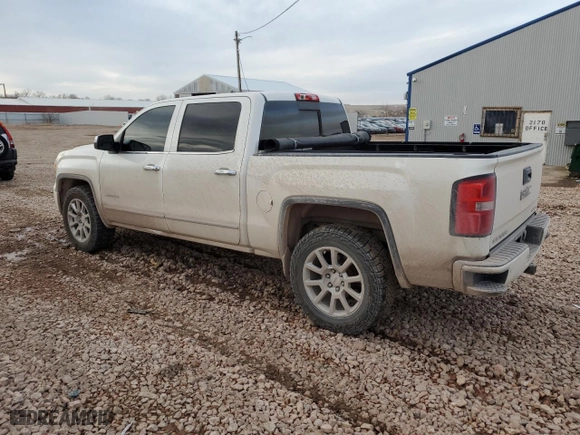 2015 GMC Sierra 1500 Denali with VIN 3GTU2WECXFG163440, listed as a Copart auction lot 43476865 with 129,142 mi miles and Salvage Title. Bid and sale history available at carsss.com. Image 2.