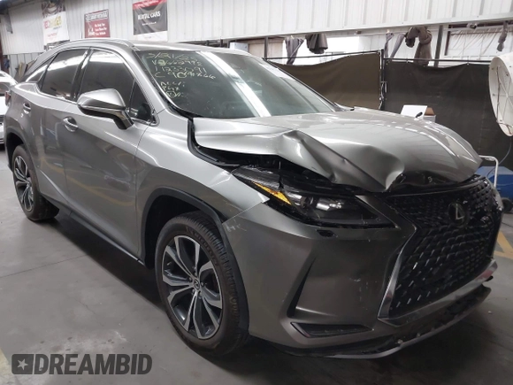 2022 Lexus RX 350 z VIN 2T2HZMDA9NC366292, wystawiony jako IAAI lot #42381449 z przebiegiem 26 717 mil mil oraz . Historia ofert i sprzedaży dostępna na DreamBid. Obrazek 1.