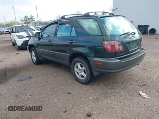 1999 Lexus RX 300 Luxury SUV with VIN JT6HF10U0X0034001, listed as a IAAI auction lot 41804468 with 166,072 mi miles. Bid and sale history available at carsss.com. Image 3.