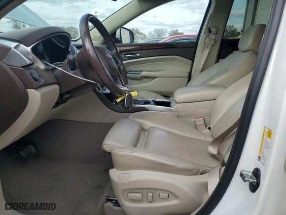 2015 Cadillac SRX Premium Collection with VIN 3GYFNDE31FS587892, listed as a Copart auction lot 77832114 with 103,168 mi miles and Salvage Title. Bid and sale history available at carsss.com. Image 7.