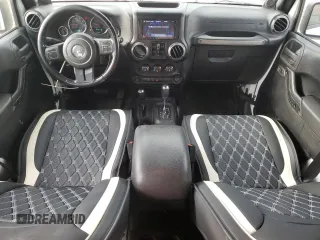 2012 Jeep Wrangler Unlimited Sport z VIN 1C4BJWDG9CL169159, wystawiony jako Copart lot #83647894 z przebiegiem 120 684 mil mil oraz Szkoda całkowita • Salvage title. Historia ofert i sprzedaży dostępna na DreamBid. Obrazek 8.