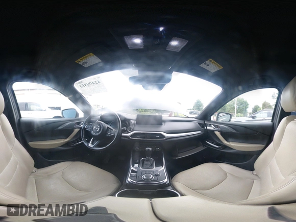 2022 Mazda CX-9 Grand Touring with VIN JM3TCBDYXN0627657, listed as a IAAI auction lot 42498856 with 61,044 mi miles and . Bid and sale history available at DreamBid. Image 18.