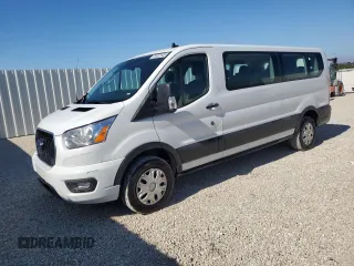 2021 Ford Transit Passenger XL with VIN 1FBAX2Y89MKA31848, listed as a Copart auction lot 86008884 with 86,476 mi miles and Clean Title. Bid and sale history available at DreamBid. Image 1.