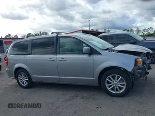 2018 Dodge Grand Caravan SXT z VIN 2C4RDGCG4JR179115, wystawiony jako IAAI lot #41163101 z przebiegiem 107 258 mil mil oraz . Historia ofert i sprzedaży dostępna na DreamBid. Obrazek 14.