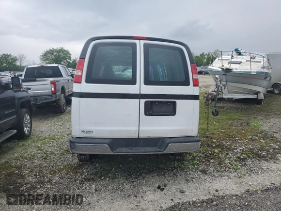 2018 Chevrolet Express Cargo z VIN 1GCWGAFG7J1906965, wystawiony jako Copart lot #56163435 z przebiegiem Nie podano mil oraz Szkoda całkowita • Salvage title. Historia ofert i sprzedaży dostępna na DreamBid. Obrazek 6.