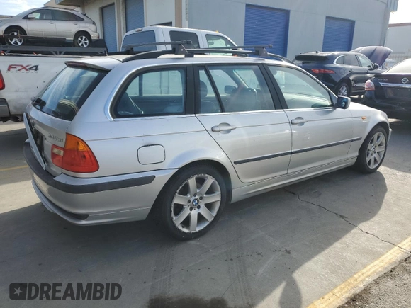 2003 BMW 3 Series 325xi with VIN WBAEP33403PF02178, listed as a Copart auction lot 74569114 with 201,557 mi miles and Clean Title. Bid and sale history available at carsss.com. Image 3.