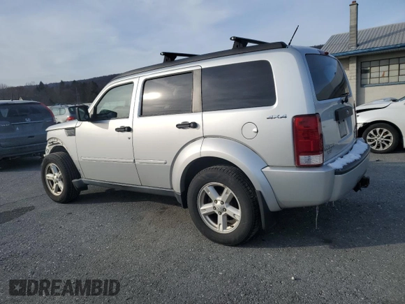 2009 Dodge Nitro SXT with VIN 1D8GU28K19W545432, listed as a Copart auction lot 86243914 with 144,577 mi miles and Salvage Title. Bid and sale history available at DreamBid. Image 2.