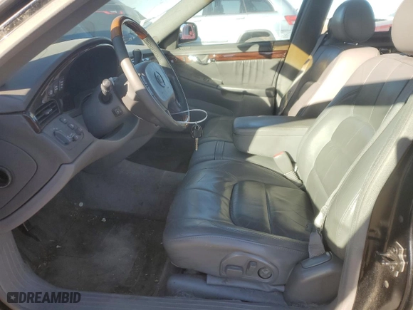 2003 Cadillac DeVille DHS with VIN 1G6KE57Y43U255513, listed as a Copart auction lot 85553464 with 222,210 mi miles and Non Repairable. Bid and sale history available at carsss.com. Image 7.