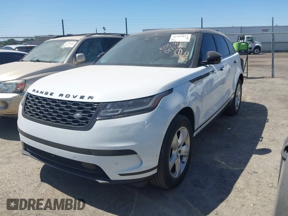 2021 Land Rover Range Rover Velar S z VIN SALYJ2EX7MA311922, wystawiony jako IAAI lot #42397827 z przebiegiem 40 514 mil mil oraz . Historia ofert i sprzedaży dostępna na DreamBid. Obrazek 2.