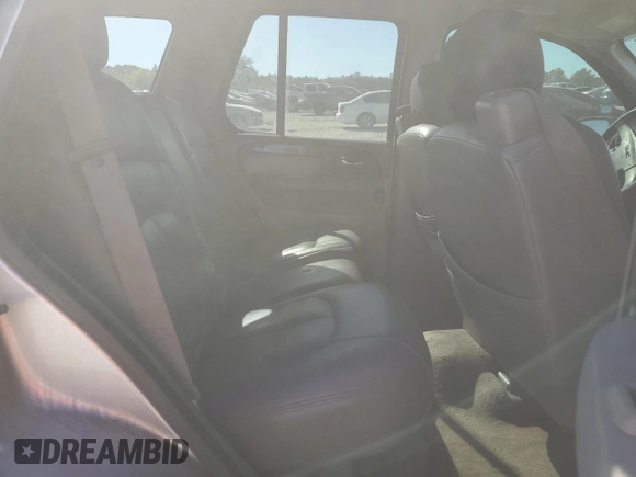 2004 GMC Envoy SLE with VIN 1GKDS13SX42374385, listed as a Copart auction lot 50150065 with 0 mi miles and Salvage Title. Bid and sale history available at carsss.com. Image 12.