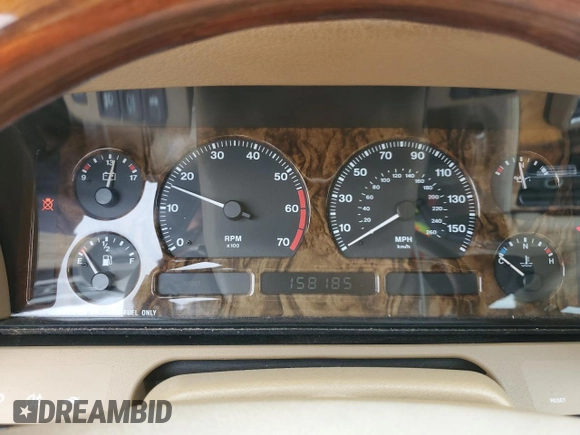 1997 Jaguar XJ Vanden Plas with VIN SAJKX6245VC800386, listed as a Copart auction lot 53651675 with 158,185 mi miles and Salvage Title. Bid and sale history available at DreamBid. Image 9.