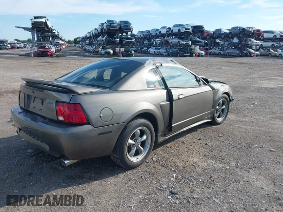 2004 Ford Mustang Standard z VIN 1FAFP40684F194867, wystawiony jako IAAI lot #39963442 z przebiegiem Nie podano mil oraz . Historia ofert i sprzedaży dostępna na DreamBid. Obrazek 4.