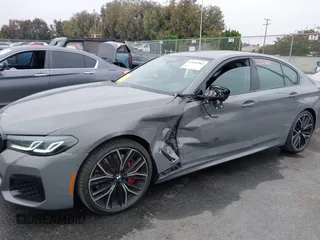2022 BMW 5 Series M550i xDrive with VIN WBA13BK07NCL07995, listed as a IAAI auction lot 42454963 with 12,721 mi miles and . Bid and sale history available at DreamBid. Image 6.