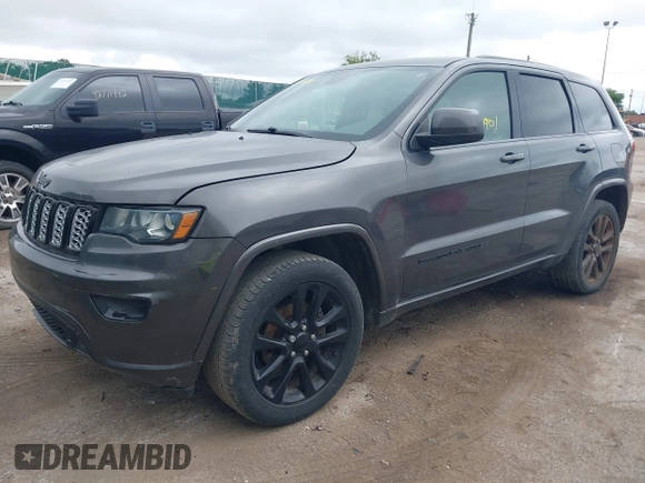 2018 Jeep Grand Cherokee Altitude z VIN 1C4RJFAGXJC190814, wystawiony jako IAAI lot #42660901 z przebiegiem 127 632 mil mil oraz . Historia ofert i sprzedaży dostępna na DreamBid. Obrazek 2.