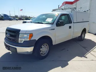 2014 Ford F-150 XL with VIN 1FTMF1CM4EKG22844, listed as a IAAI auction lot 41669259 with 242,141 mi miles. Bid and sale history available at carsss.com. Image 16.