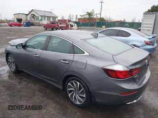 2020 Honda Insight Touring with VIN 19XZE4F98LE011149, listed as a IAAI auction lot 41834043 with 54,251 mi miles and . Bid and sale history available at carsss.com. Image 3.