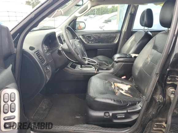 2006 Ford Escape Limited z VIN 1FMCU04146KA60909, wystawiony jako Copart lot #58019215 z przebiegiem 156 752 mil mil oraz Szkoda całkowita • Salvage title. Historia ofert i sprzedaży dostępna na DreamBid. Obrazek 7.