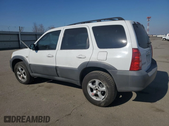 2005 Mazda Tribute i with VIN 4F2YZ02Z95KM24700, listed as a Copart auction lot 42002775 with 128,891 mi miles and Salvage Title. Bid and sale history available at carsss.com. Image 2.
