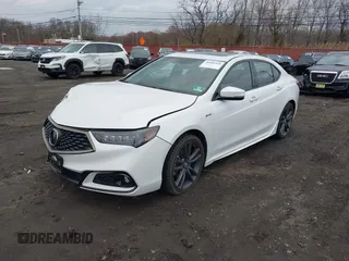 2019 Acura TLX w/A-Spec Pkg with VIN 19UUB1F61KA002075, listed as a IAAI auction lot 40991938 with 49,402 mi miles. Bid and sale history available at carsss.com. Image 2.