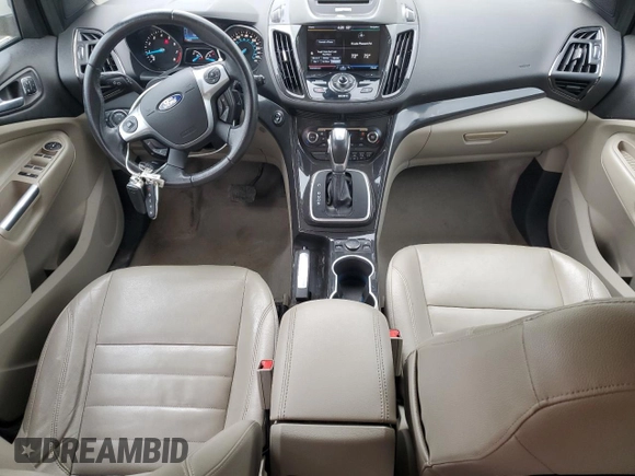 2014 Ford Escape Titanium с VIN 1FMCU0J97EUA87342, выставлен на аукционе Copart как лот 58790145 с пробегом 174 663 миль миль и Чистый • Clean title. История ставок и продаж доступна на DreamBid. Изображение 8.