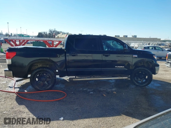 2011 Toyota Tundra z VIN 5TFEY5F12BX115107, wystawiony jako IAAI lot #41426224 z przebiegiem 143 487 mil mil oraz . Historia ofert i sprzedaży dostępna na DreamBid. Obrazek 13.