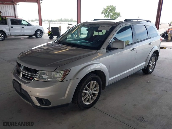 2014 Dodge Journey SXT with VIN 3C4PDCBG8ET115387, listed as a IAAI auction lot 42042535 with 171,279 mi miles. Bid and sale history available at carsss.com. Image 2.