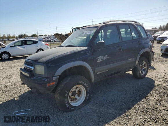 2002 Chevrolet Tracker ZR2 with VIN 2CNBJ734X26948098, listed as a Copart auction lot 73135754 with 234,627 mi miles and Salvage title. Bid and sale history available at DreamBid. Image 1.